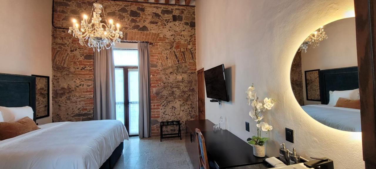 פואבלה Milo Collection Hotel מראה חיצוני תמונה