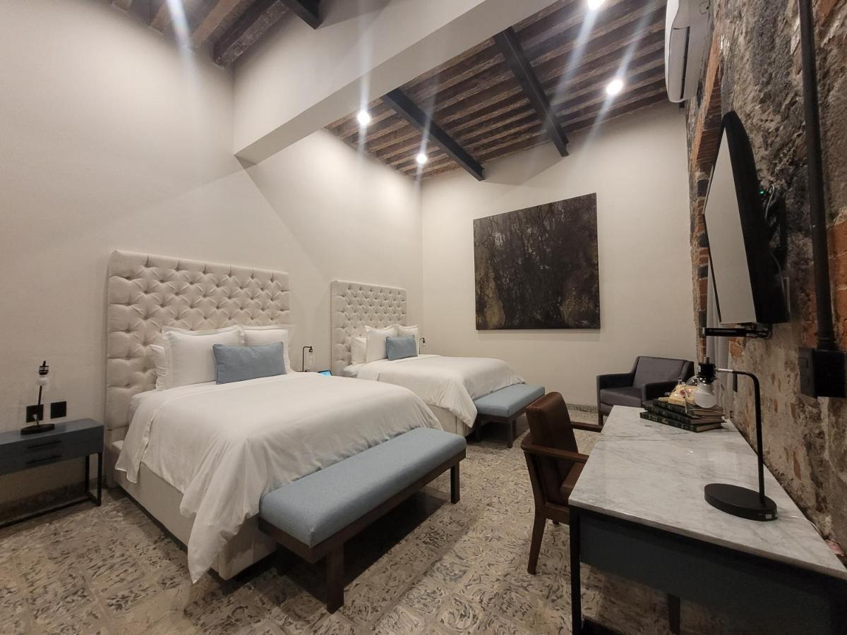 פואבלה Milo Collection Hotel מראה חיצוני תמונה
