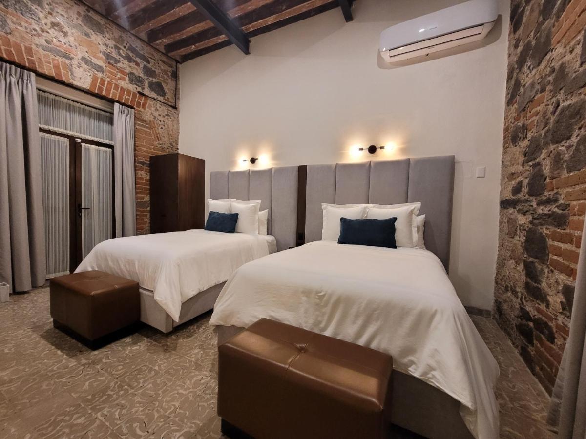 פואבלה Milo Collection Hotel מראה חיצוני תמונה