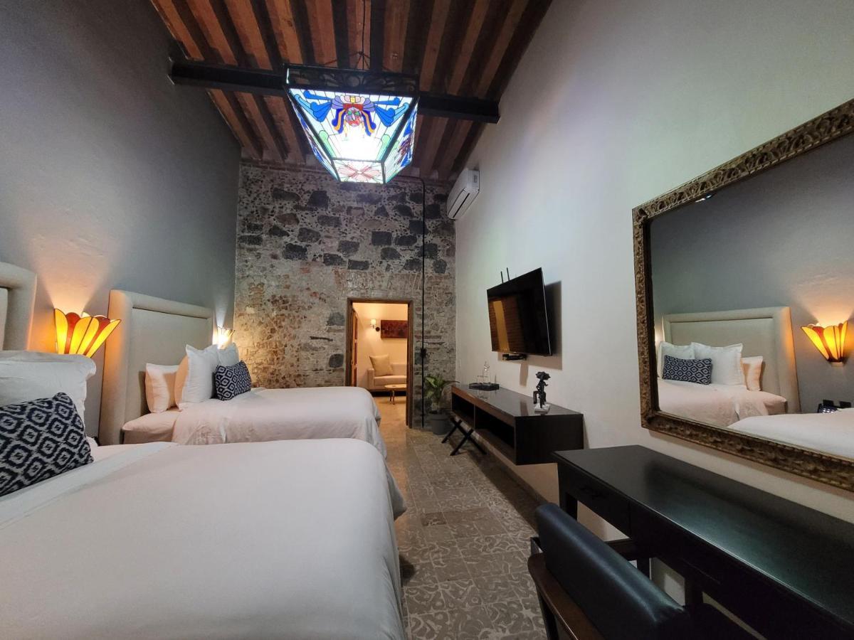 פואבלה Milo Collection Hotel מראה חיצוני תמונה