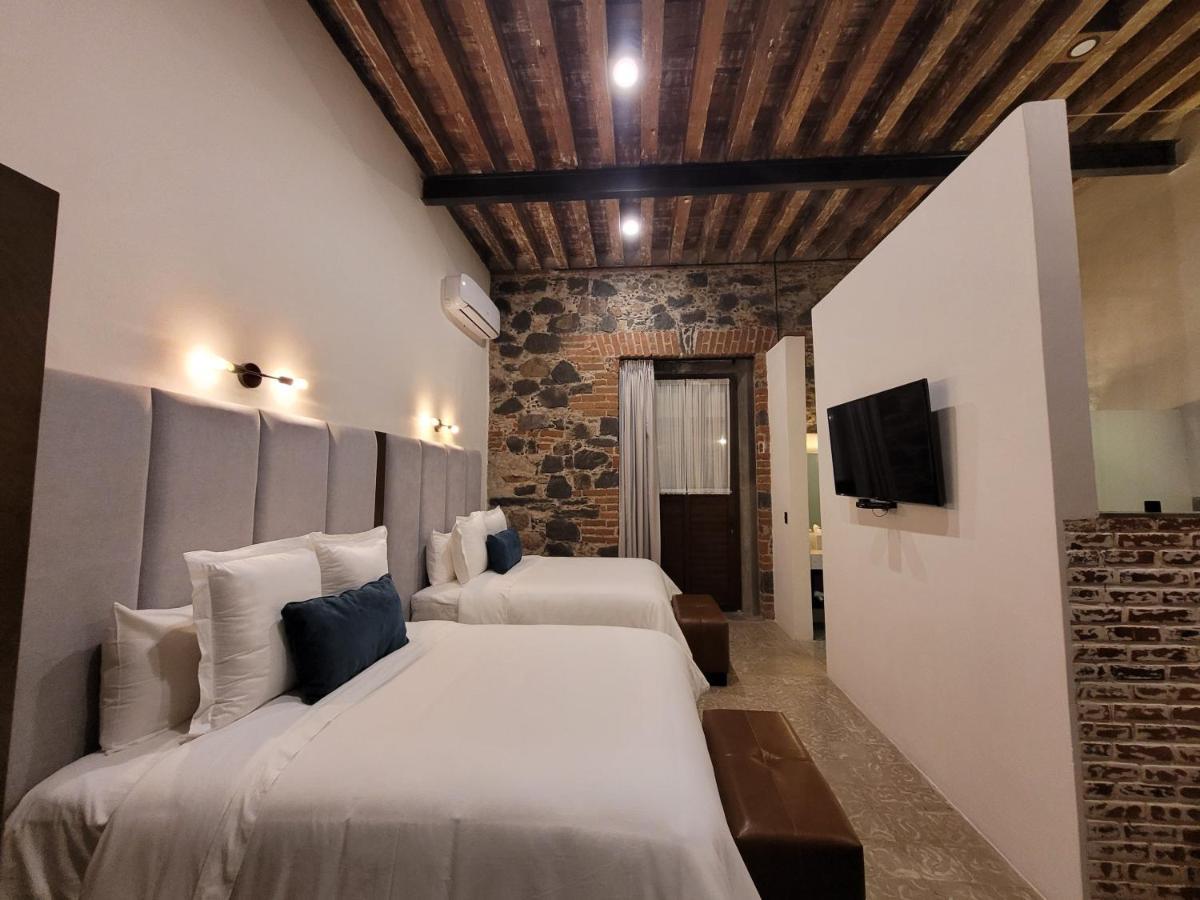 פואבלה Milo Collection Hotel מראה חיצוני תמונה
