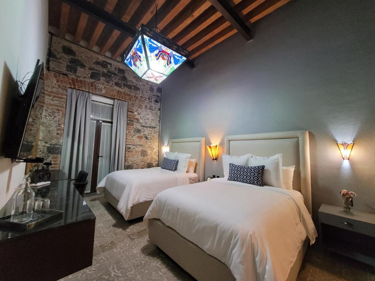 פואבלה Milo Collection Hotel מראה חיצוני תמונה