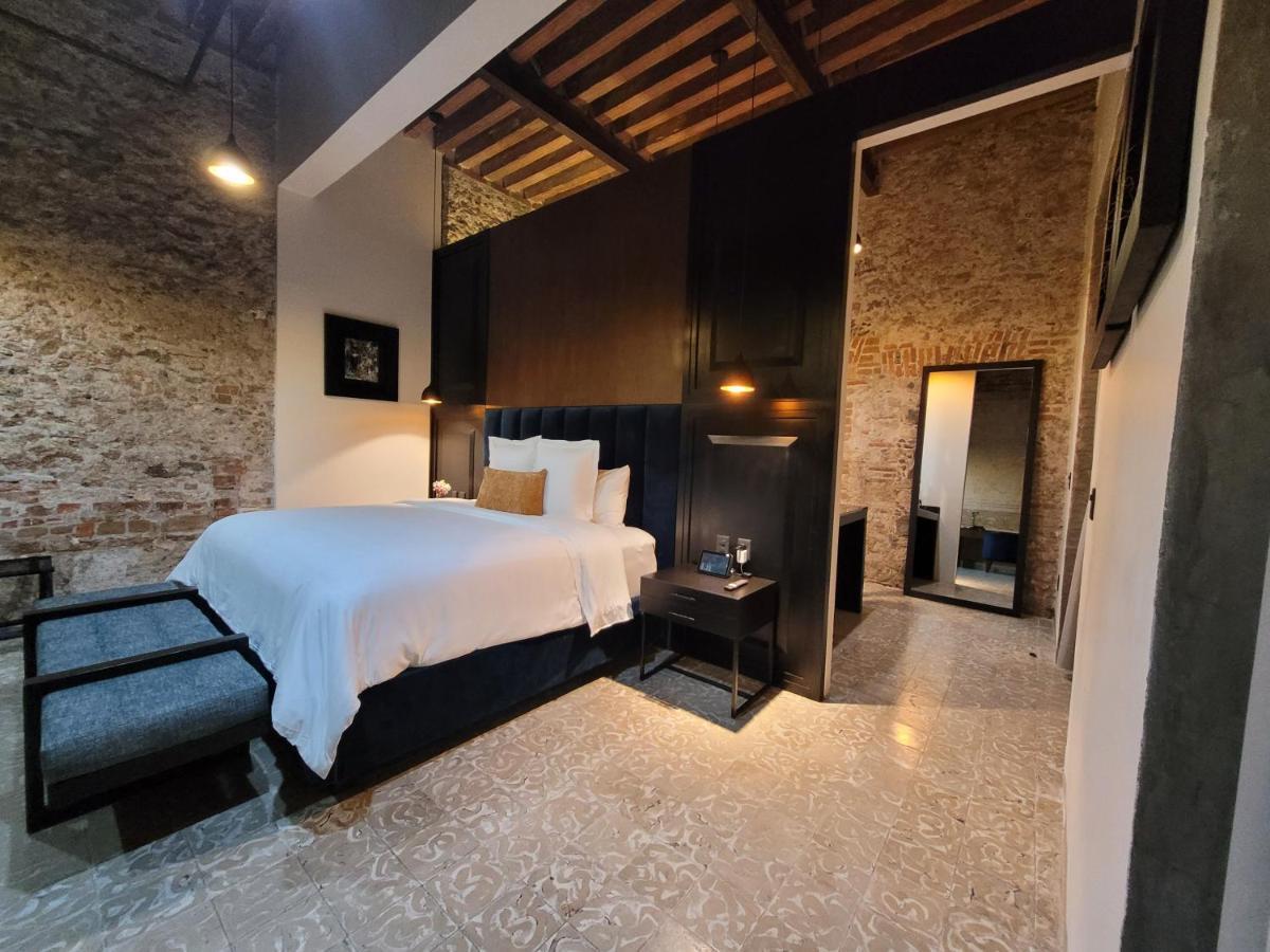 פואבלה Milo Collection Hotel מראה חיצוני תמונה