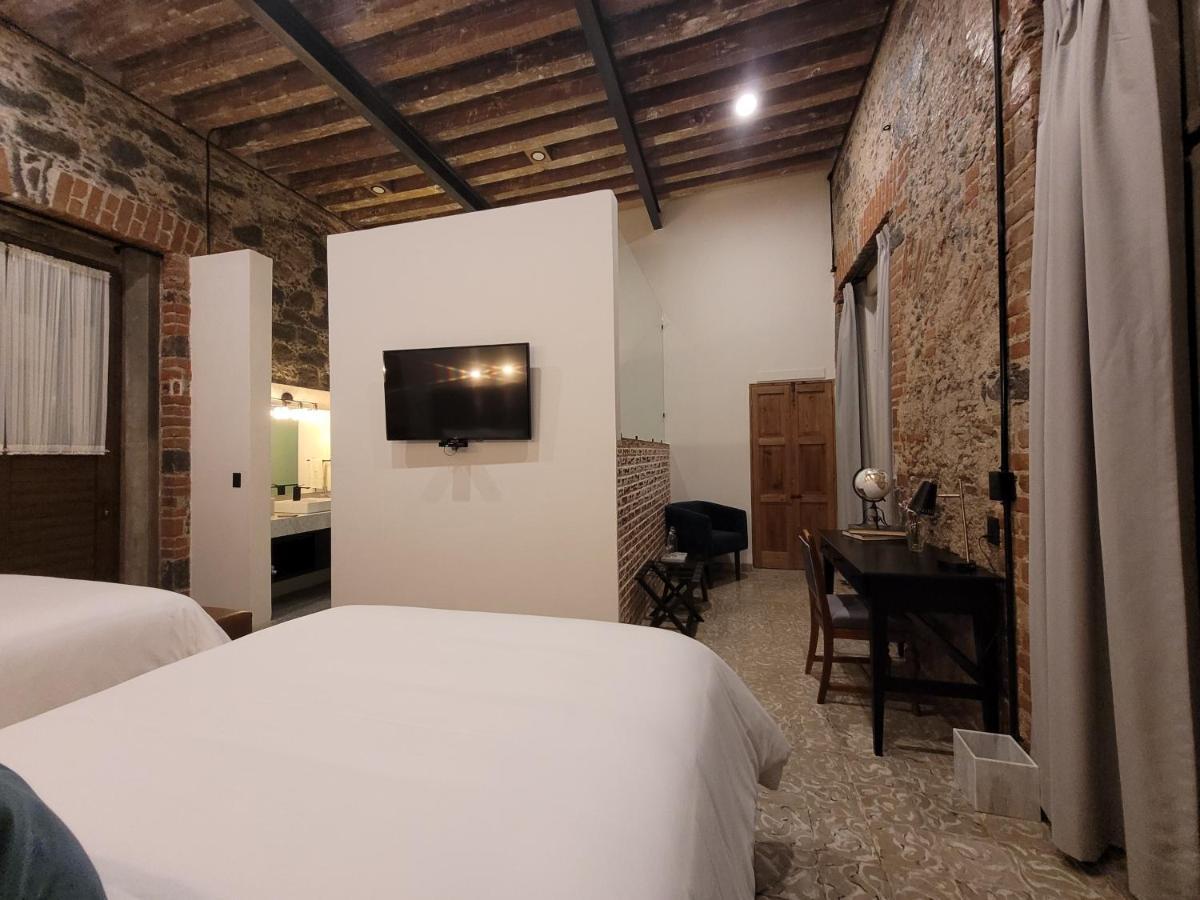 פואבלה Milo Collection Hotel מראה חיצוני תמונה