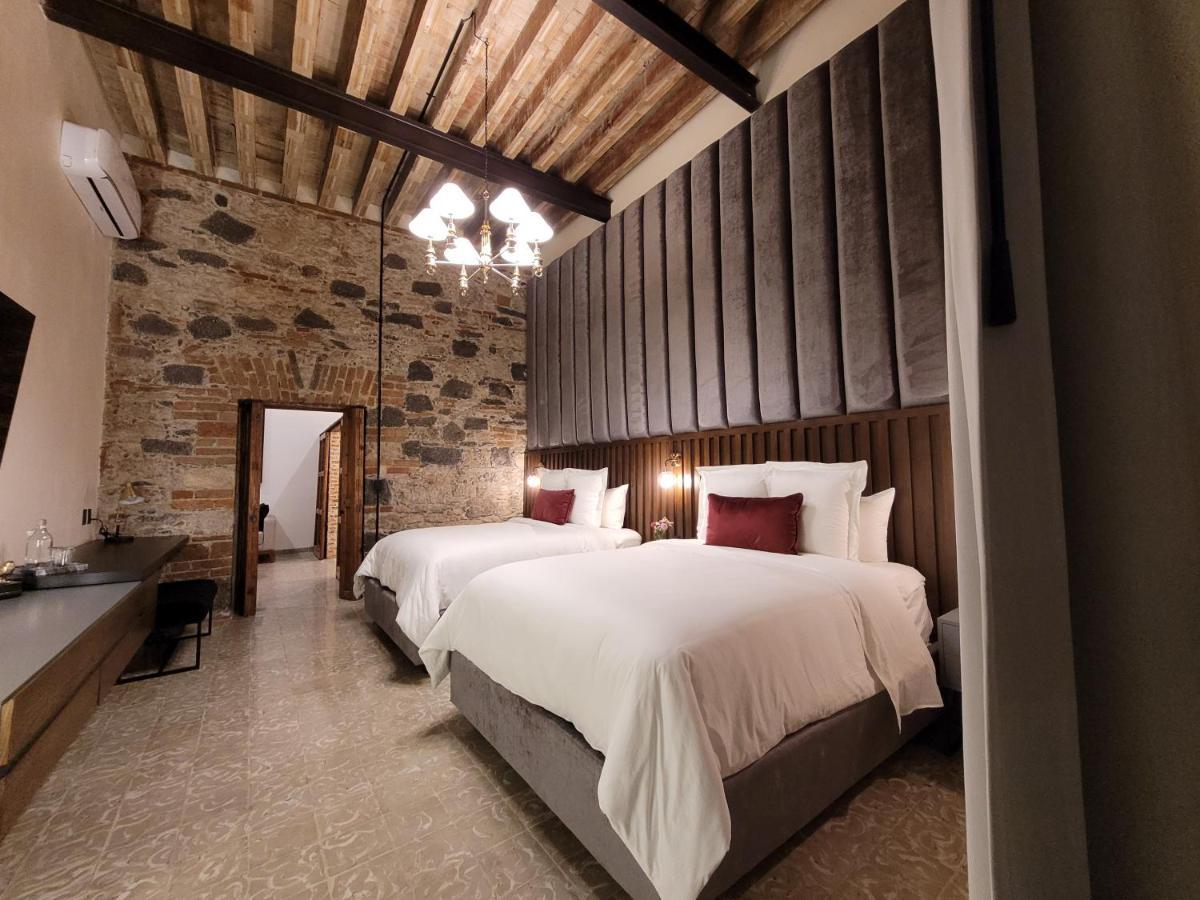 פואבלה Milo Collection Hotel מראה חיצוני תמונה